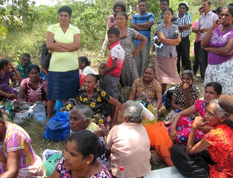 A rural community gathered on disputed land